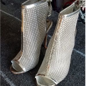 Silver Booties with the peep toe Size 8 1/2
